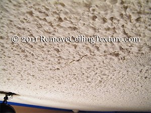 cracked popcorn ceiling in coquitlam prevents sale of apartment