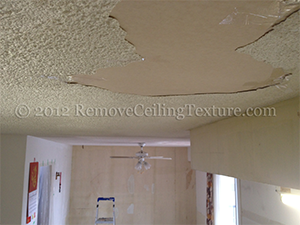 Laky roof in Burnaby causes cracked and delaminated ceilings