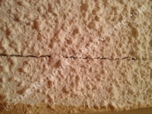 Cracked ceiling texture reduces property value